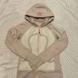 Pink and white lululemon sweater